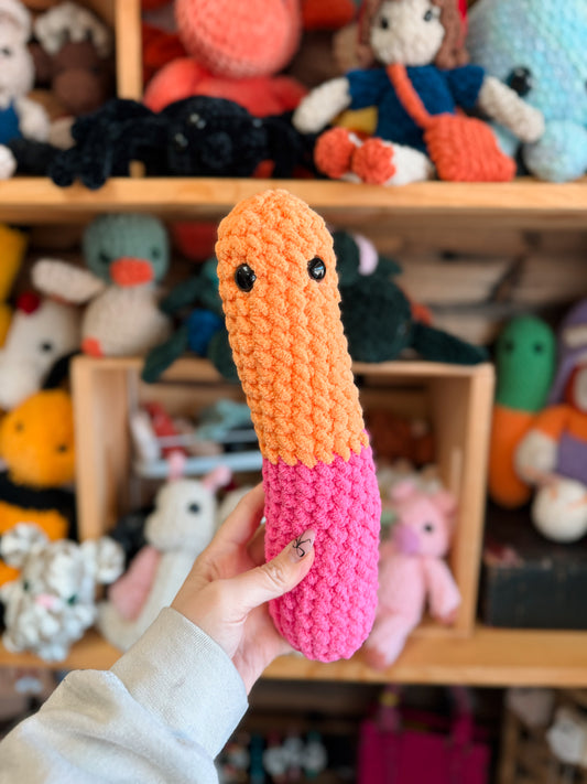 Orange and pink gummy worm