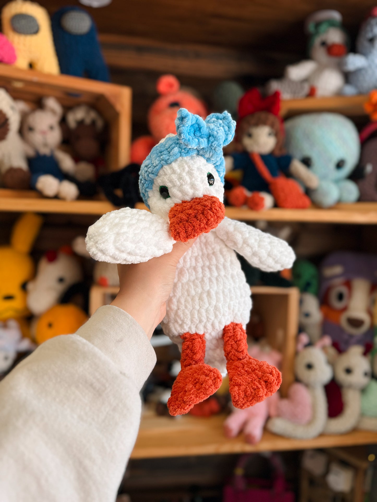 Ducking snuggler with blue headband