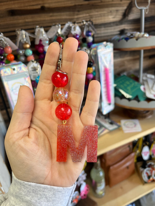 Keychain -red shimmer, red glitter, red clear beads w/ orange glitter M