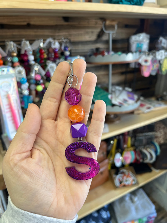 Keychain - clear purple, orange swirl, purple cube w/ purple glitter S