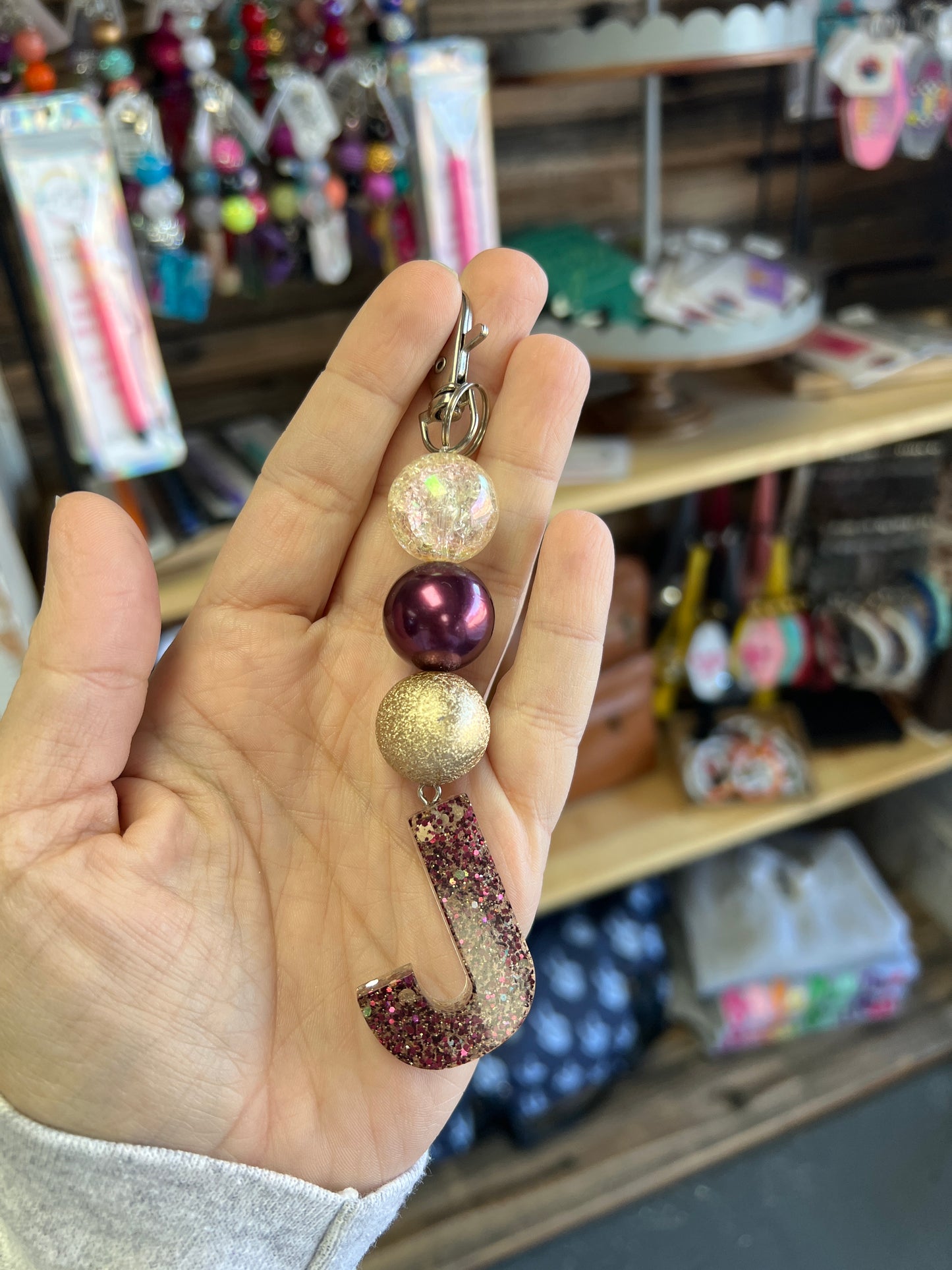 Keychain - cream crackle, maroon, textured gold beads w/ maroon J