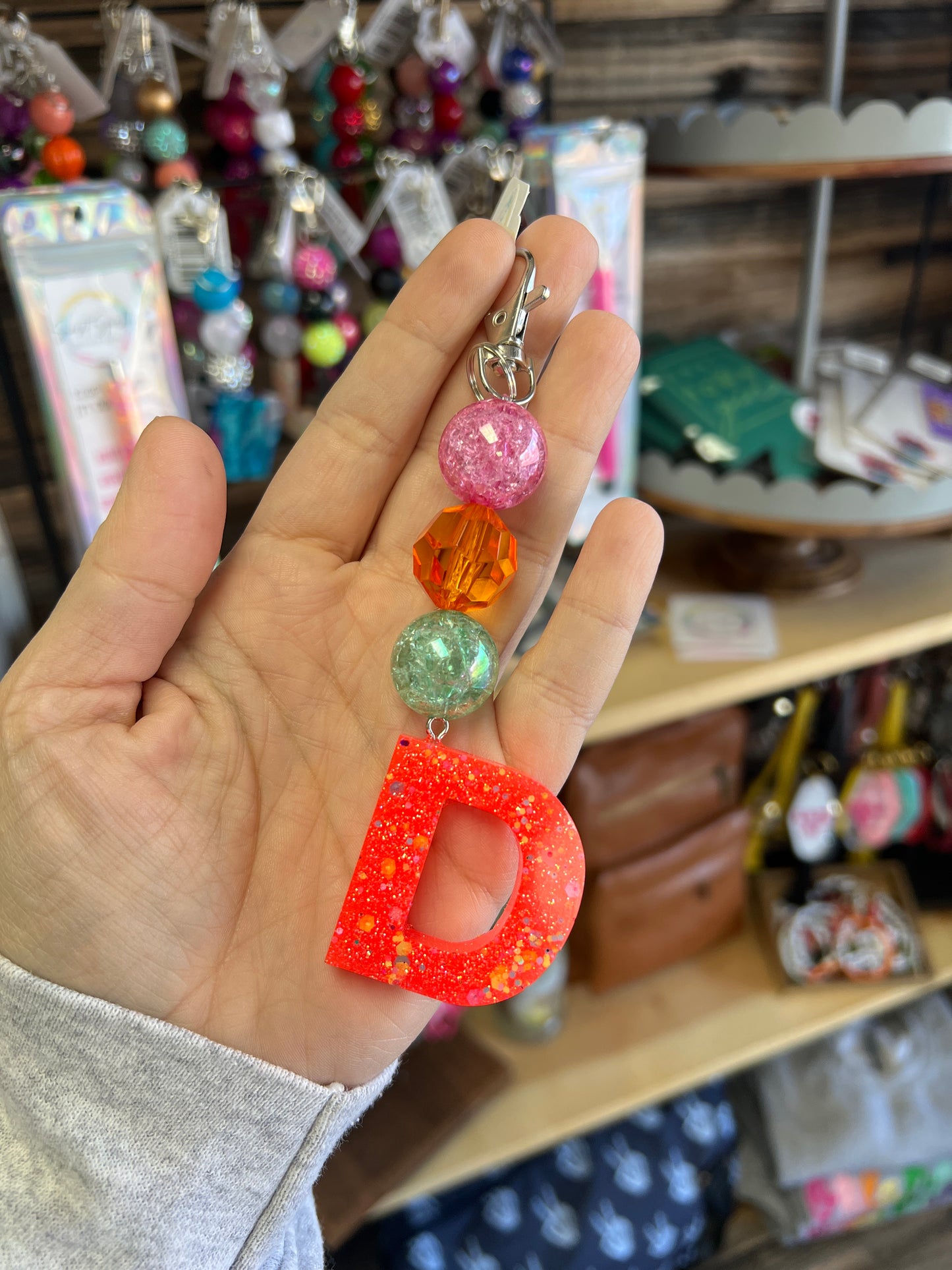 Keychain -pink crackle, orange clear, teal crackle beads w/ orange and confetti glitter D