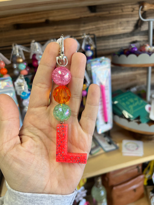 Keychain - pink crackle, orange clear, teal crackle beads w/ orange and teal glitter L