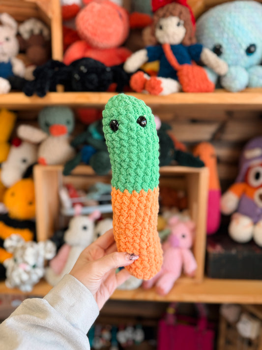 Orange and green gummy worm