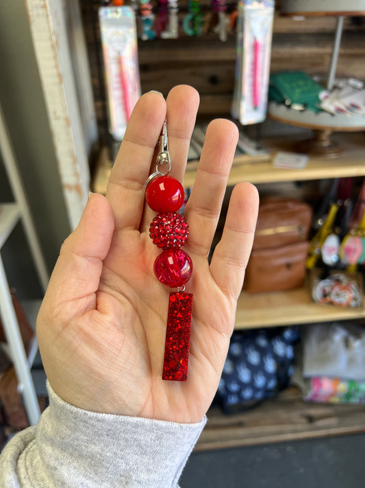 Keychain - solid red, red rhinestone, tinsel read beads w/ red gltter I