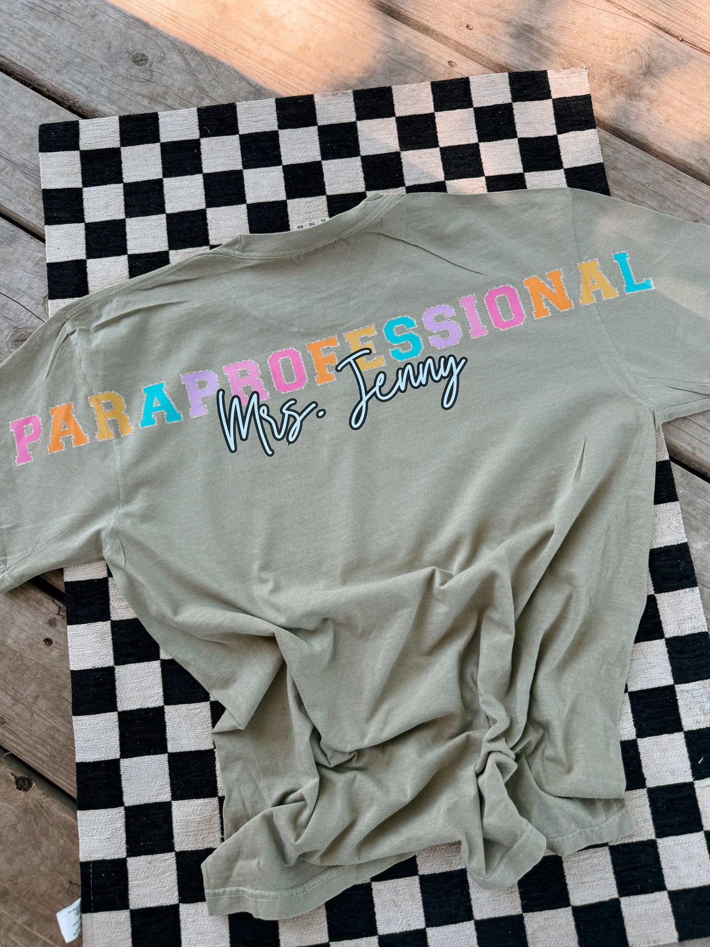 large back paraprofessional + name