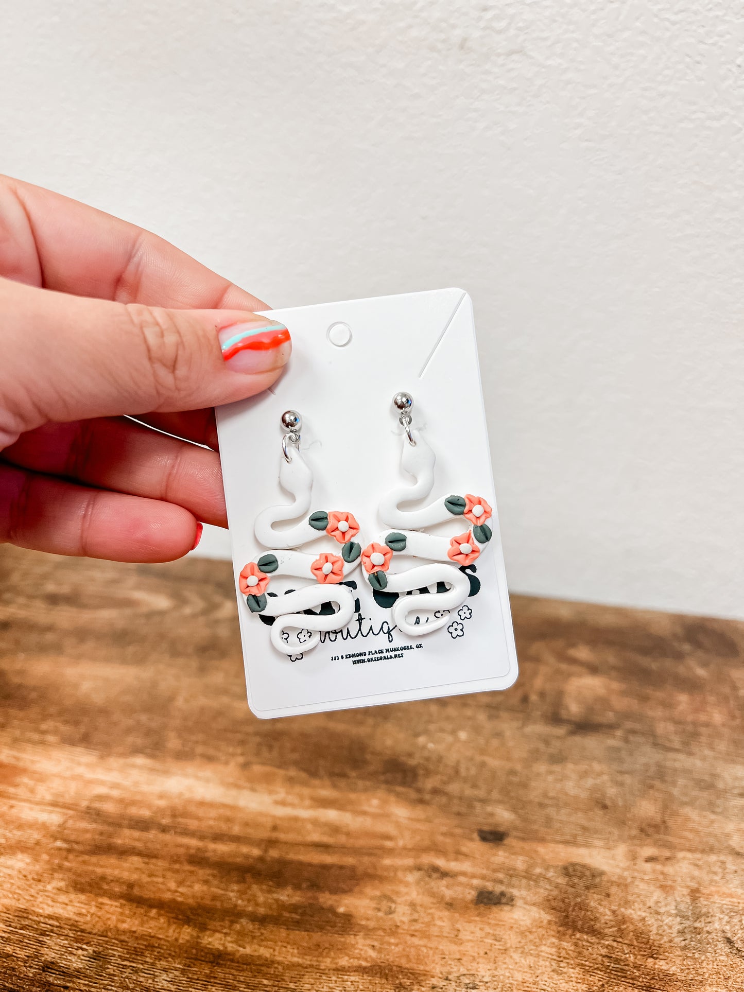 White Floral Snake Clay Earrings